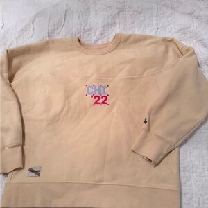 Tracksmith yellow Chicago crew